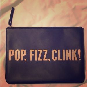 Pop Fizz Clink Black and Gold kate spade clutch